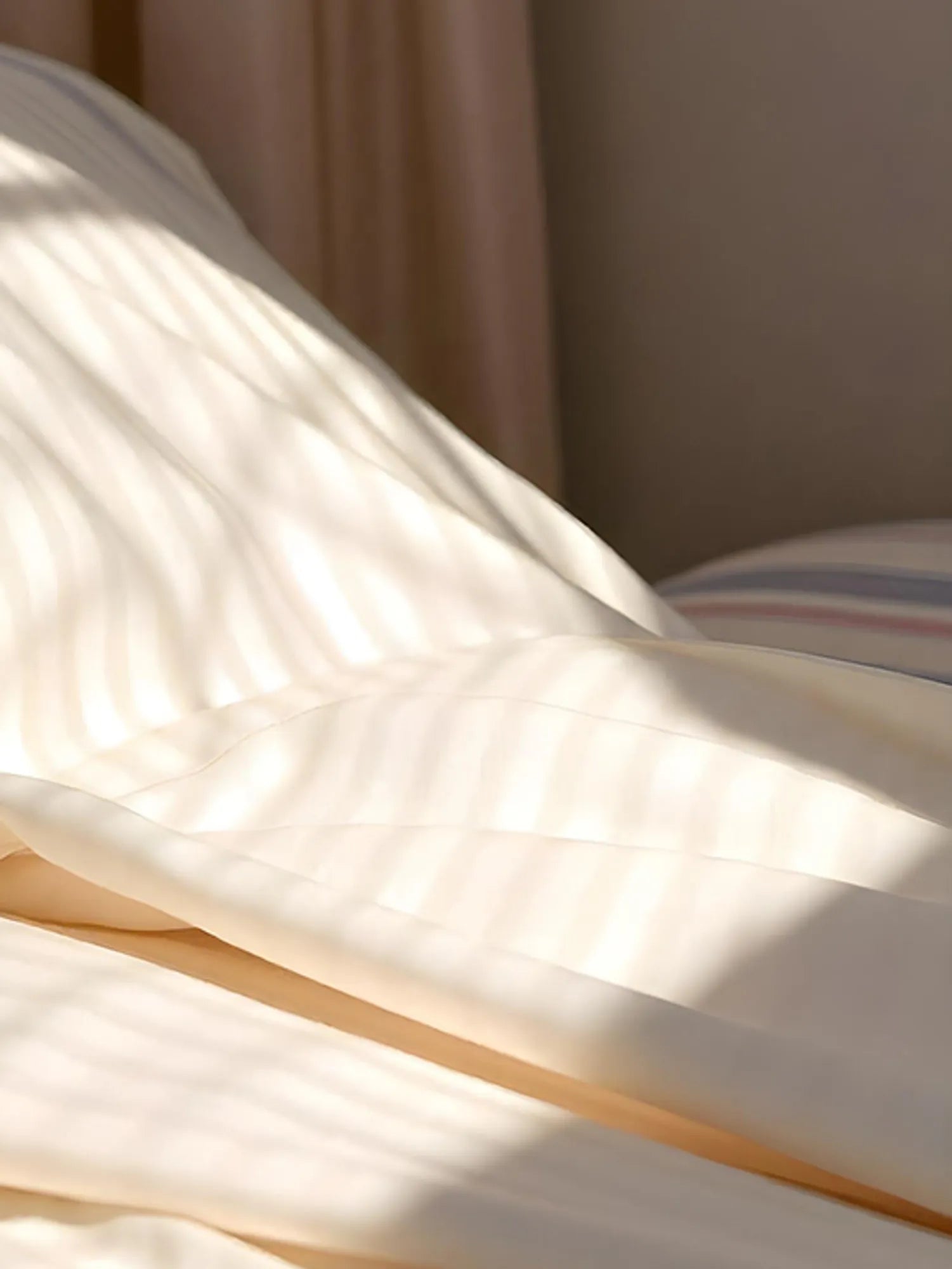Sunlight dances across the silky folds of this eco-friendly bedding from Supreme Rest, crafted for luxurious morning serenity