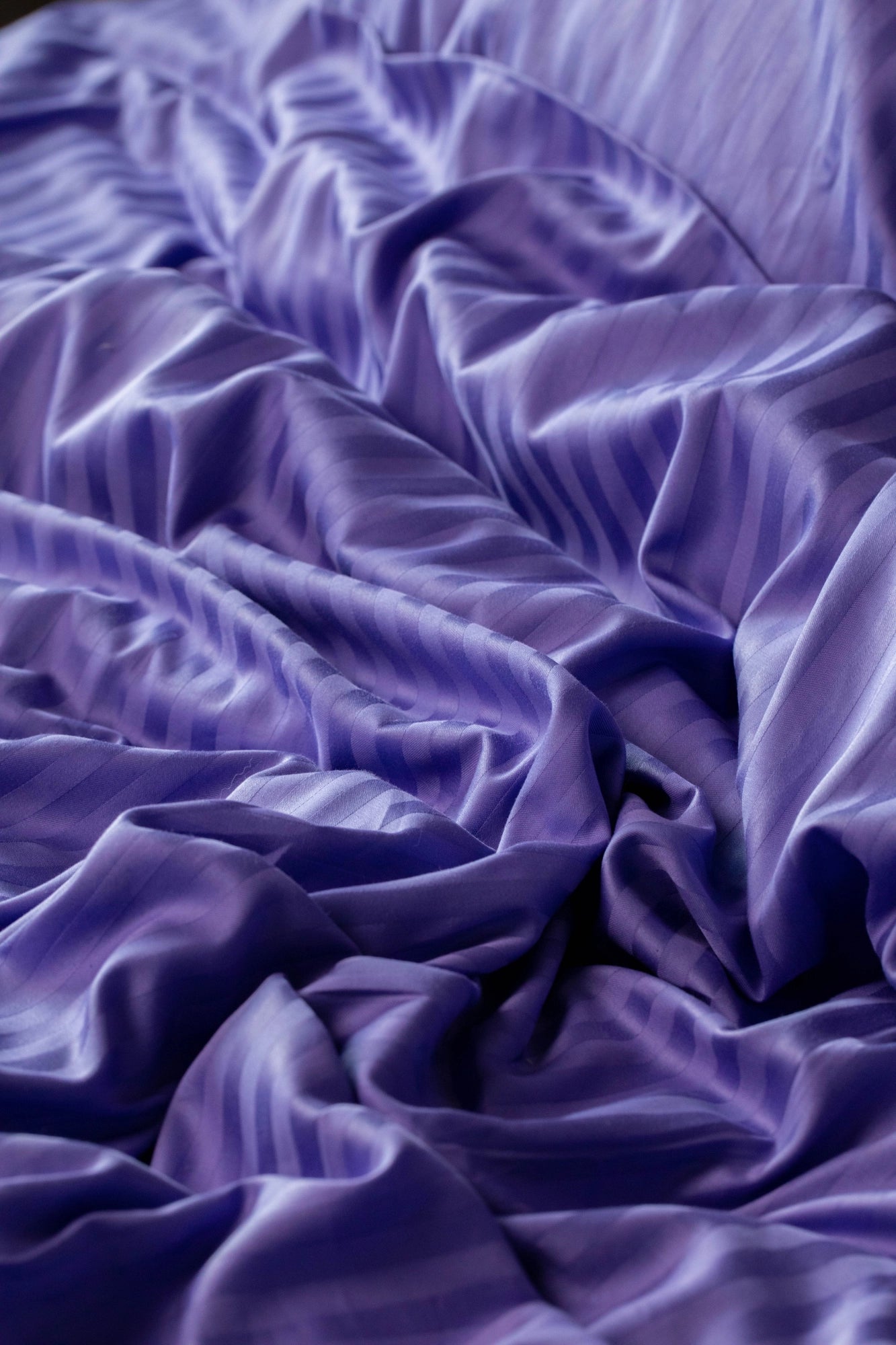 Close-up of Supreme Rest Patagonian Lupine duvet cover’s elegant striped pattern in soft sateen cotton.