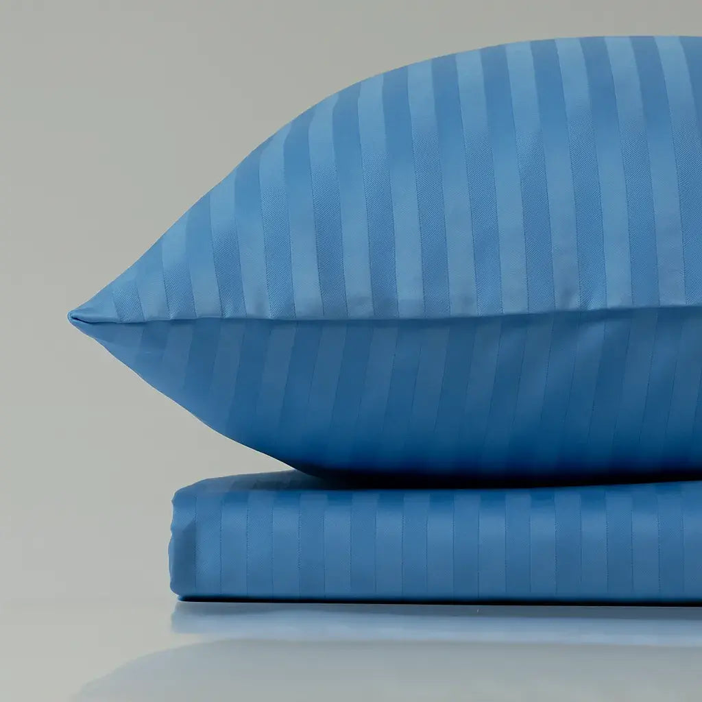 Supreme Rest Celestial Blue striped pillow and sheet set – eco-friendly custom bedding designed for luxurious, peaceful sleep comfort.