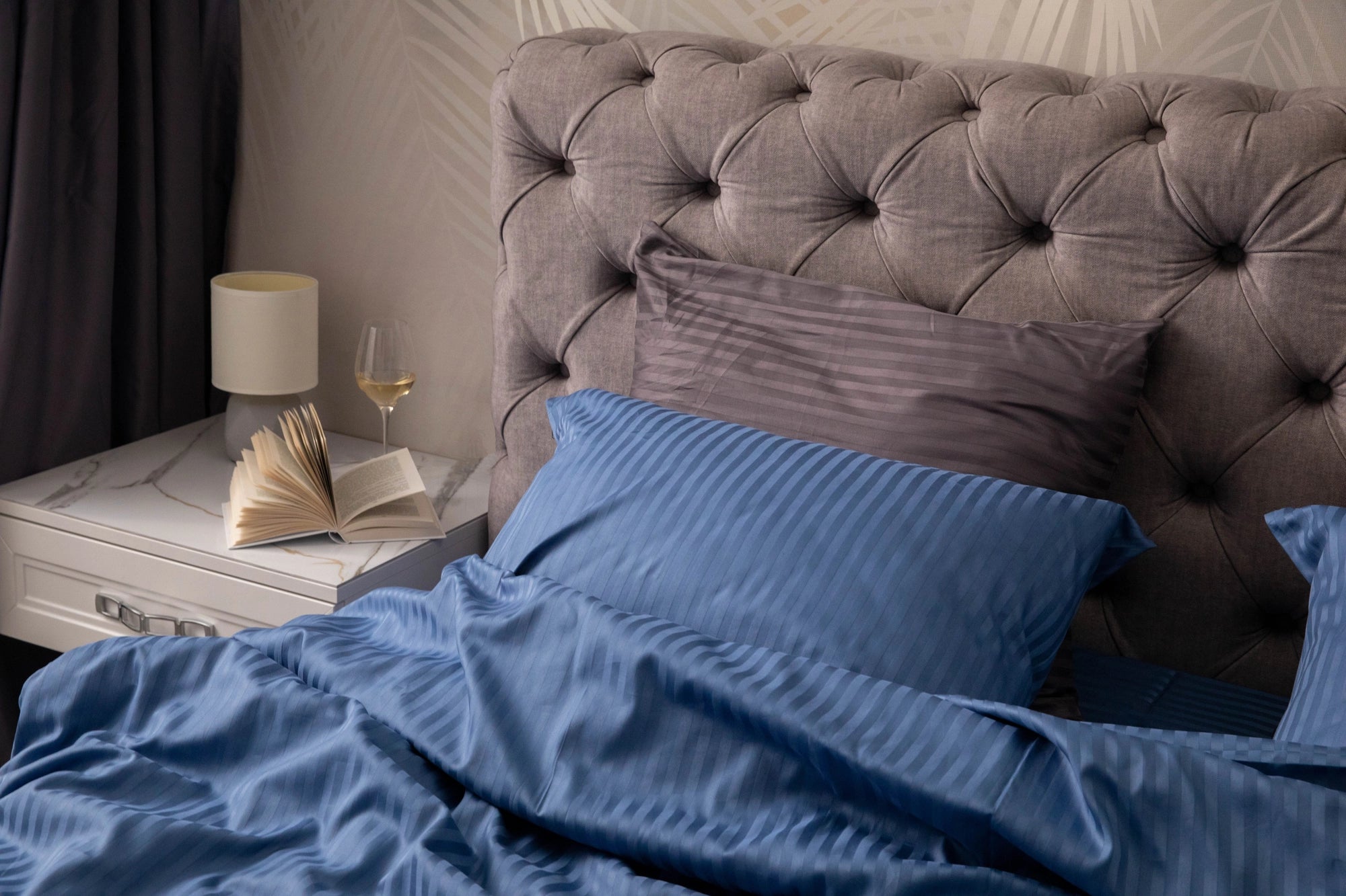 Supreme Rest custom made bed set in ocean blue and charcoal, styled in a serene bedroom with eco-friendly elegance and luxury comfort