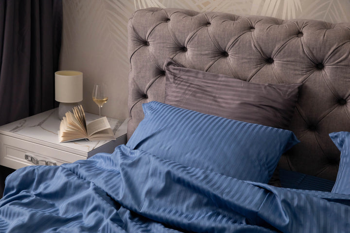 Supreme Rest custom made bed set in ocean blue and charcoal, styled in a serene bedroom with eco-friendly elegance and luxury comfort