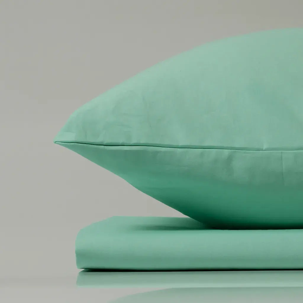 Supreme Rest Glacial Waters aqua pillow and sheet set – eco-friendly custom bedding designed for fresh, modern and sustainable sleep comfort.