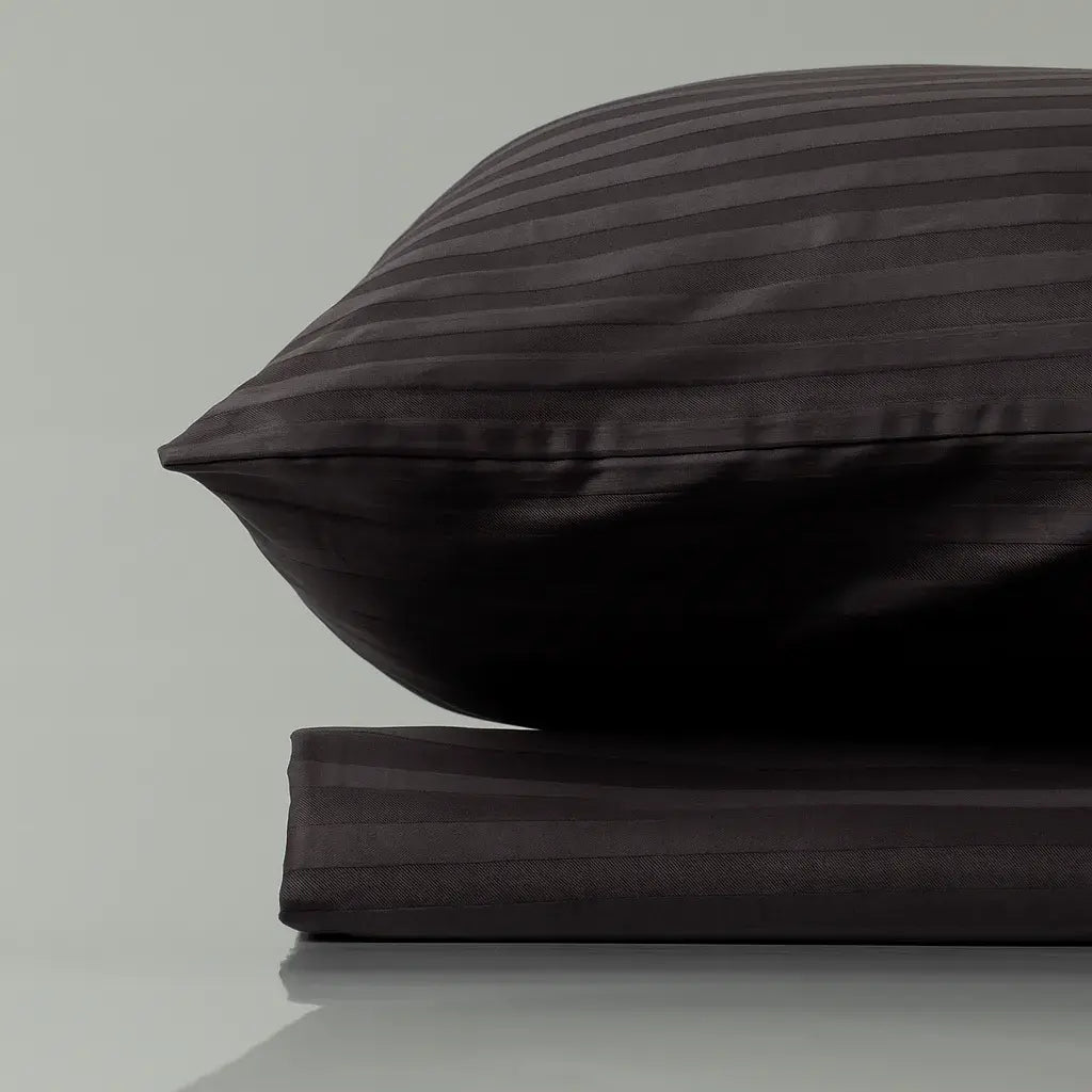Supreme Rest Graphite Chic striped pillow and sheet set – eco-friendly custom bedding blending modern elegance with sustainable comfort.