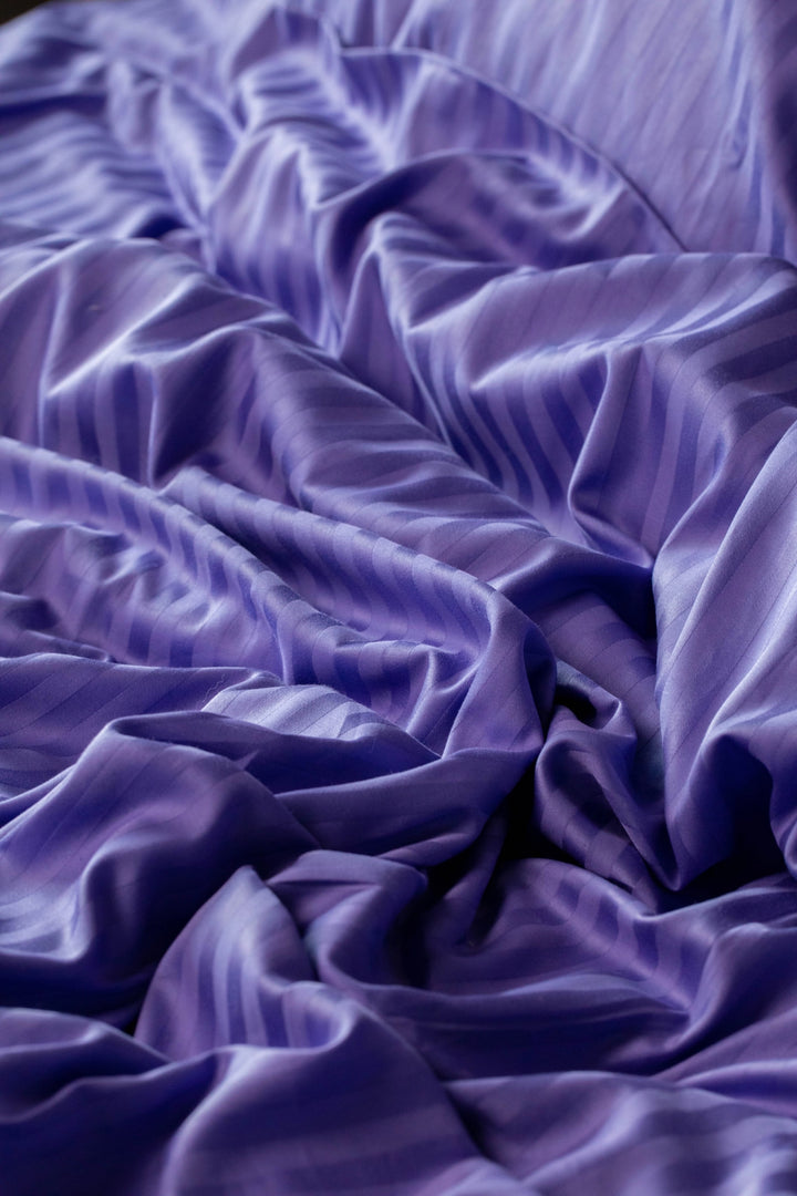Close-up of Supreme Rest Patagonian Lupine duvet cover’s elegant striped pattern in soft sateen cotton.