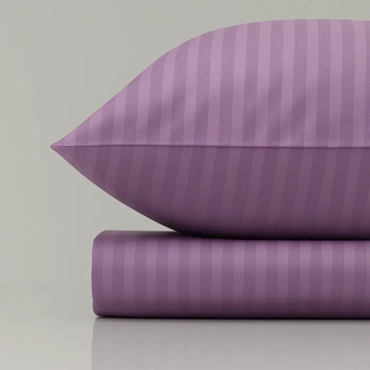 Lilac striped sateen bedding set with pillowcase, crafted for a smooth, luxurious feel in your bedroom.