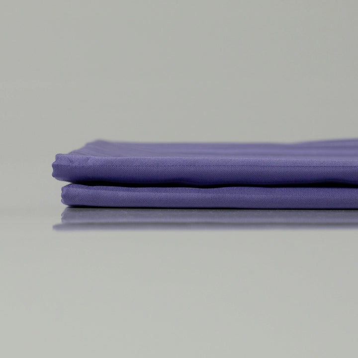 Close-up of Supreme Rest Patagonian Lupine sheet’s elegant striped pattern in soft sateen cotton.